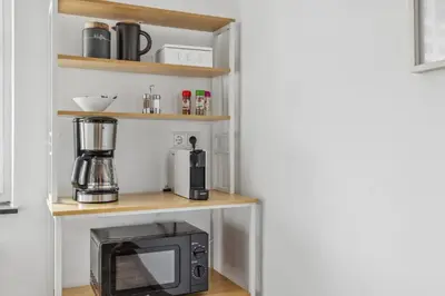 Küche/Küchenzeile in der Unterkunft Amalfi A02 - 2 Zi für 4P - Balkon, smart TV, Boxspringbett