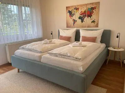Ein Bett oder Betten in einem Zimmer der Unterkunft Appartio: Studio-Appartement am Stadtrand