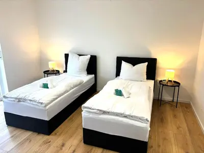 Ein Bett oder Betten in einem Zimmer der Unterkunft Kaiserslautern Apartments