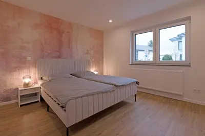 Ein Bett oder Betten in einem Zimmer der Unterkunft Casa Lorsch 1