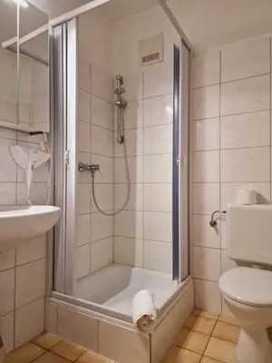 Ein Badezimmer in der Unterkunft Landhotel Neding