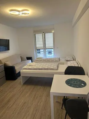 Ein Bett oder Betten in einem Zimmer der Unterkunft Neckar-Apart