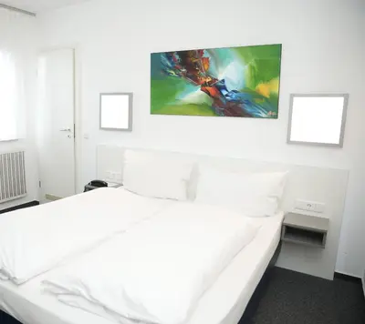 Ein Bett oder Betten in einem Zimmer der Unterkunft Weber Residenz