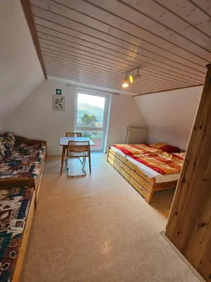 Ein Bett oder Betten in einem Zimmer der Unterkunft Naturfreundehaus