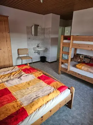 Ein Bett oder Betten in einem Zimmer der Unterkunft Naturfreundehaus