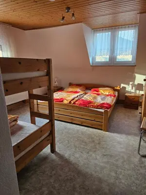 Ein Bett oder Betten in einem Zimmer der Unterkunft Naturfreundehaus