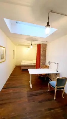 Ein Bett oder Betten in einem Zimmer der Unterkunft Helles Zimmer im Loft