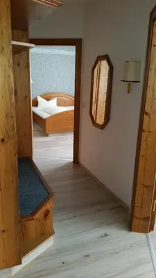 Ein Bett oder Betten in einem Zimmer der Unterkunft Hotel Büchner Garni