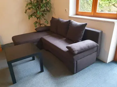 Ein Sitzbereich in der Unterkunft Ferienwohnung Tammer Allee