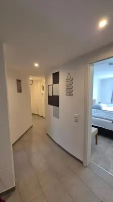 Ein Bett oder Betten in einem Zimmer der Unterkunft Volkspark-3-Zimmer-Wohnung-4 Betten-Mainz