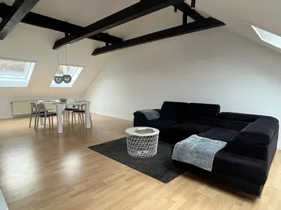 Ein Sitzbereich in der Unterkunft Ferienwohnung Mooi