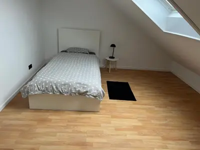 Ein Bett oder Betten in einem Zimmer der Unterkunft Ferienwohnung Mooi