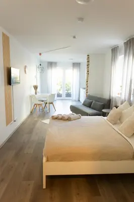 Ein Bett oder Betten in einem Zimmer der Unterkunft HUGOS Studio Apartment