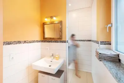 Ein Badezimmer in der Unterkunft Ferienhof Obertor Brennerei