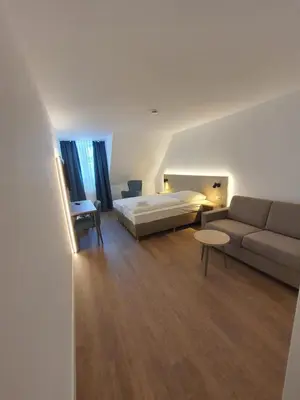 Ein Sitzbereich in der Unterkunft Hotel zur Traube