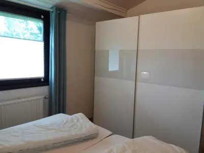 Ein Bett oder Betten in einem Zimmer der Unterkunft Ferienhaus Robinson Am Krappennest 92