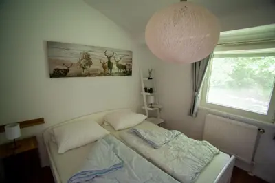 Ein Bett oder Betten in einem Zimmer der Unterkunft Ferienhaus Robinson Crusoe Schwarzkittelpfad 80