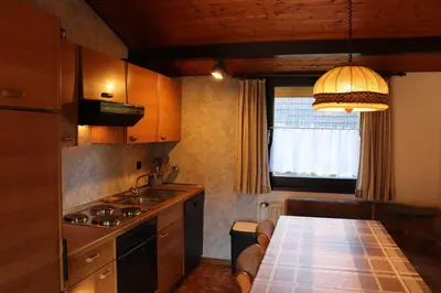 Küche/Küchenzeile in der Unterkunft Ferienhaus Robinson Im Abendrot 123