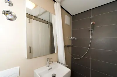 Ein Badezimmer in der Unterkunft Heidelberg ROOMS