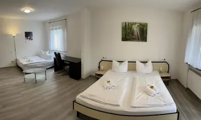 Ein Bett oder Betten in einem Zimmer der Unterkunft Landgasthof Waldeck