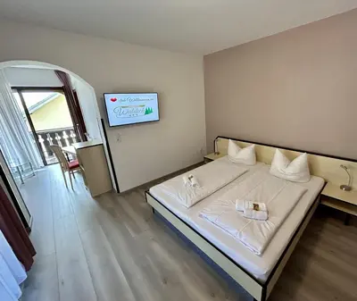Ein Bett oder Betten in einem Zimmer der Unterkunft Landgasthof Waldeck