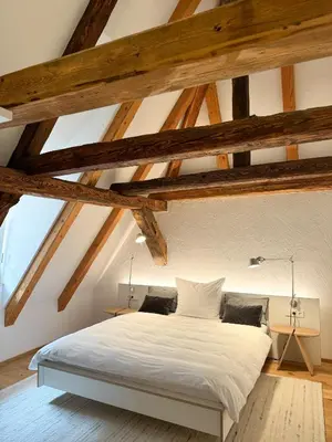 Ein Bett oder Betten in einem Zimmer der Unterkunft Gasthaus Faust
