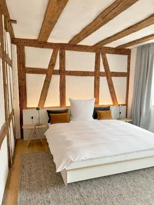 Ein Bett oder Betten in einem Zimmer der Unterkunft Gasthaus Faust