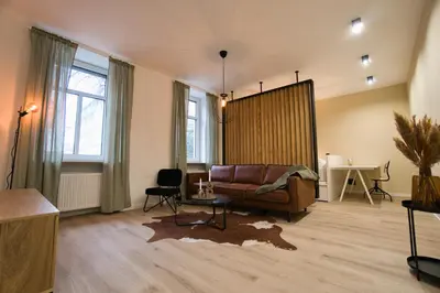 Ein Sitzbereich in der Unterkunft Goethe-Suites: Premium 4 Person Worms city centre Appartment