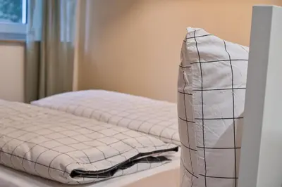 Ein Bett oder Betten in einem Zimmer der Unterkunft Goethe-Suites: Premium 4 Person Worms city centre Appartment