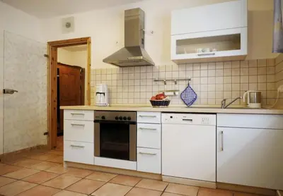 Küche/Küchenzeile in der Unterkunft Gästezimmer Weingut Rösch