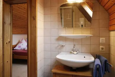 Ein Badezimmer in der Unterkunft Gästezimmer Weingut Rösch