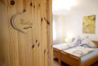Ein Bett oder Betten in einem Zimmer der Unterkunft Gästezimmer Weingut Rösch