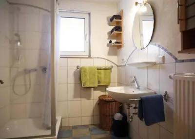Ein Badezimmer in der Unterkunft Gästezimmer Weingut Rösch