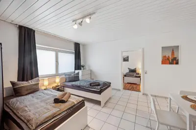 Ein Bett oder Betten in einem Zimmer der Unterkunft DA01 Monteurswohnung in Dieburg!