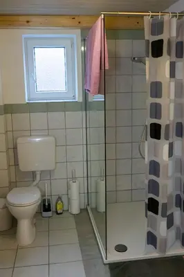 Ein Badezimmer in der Unterkunft Ferienwohnung in Wörrstadt