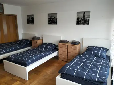Ein Bett oder Betten in einem Zimmer der Unterkunft 123-Zimmerverleih Mosbach