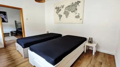 Ein Bett oder Betten in einem Zimmer der Unterkunft Schönes, geräumiges Zuhause