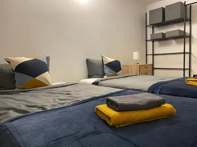 Ein Bett oder Betten in einem Zimmer der Unterkunft ImmerFrei Apartments