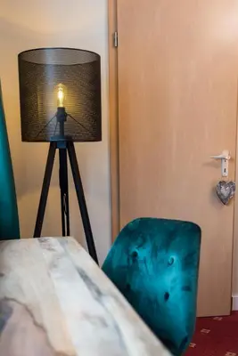 Ein Bett oder Betten in einem Zimmer der Unterkunft Landgasthof Zum Goldenen Anker