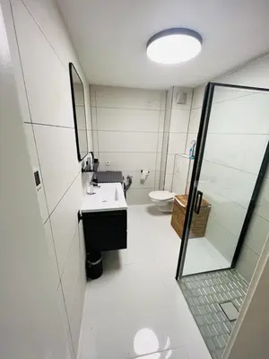 Ein Badezimmer in der Unterkunft Moderne Wohnung nahe Museum
