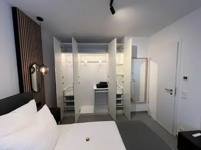 Ein Bett oder Betten in einem Zimmer der Unterkunft TimeTidy II