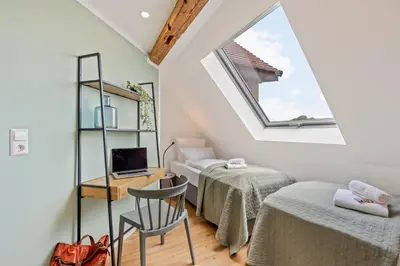 Ein Bett oder Betten in einem Zimmer der Unterkunft Sali Homes - Neuenstadt am Kocher