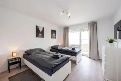Ein Bett oder Betten in einem Zimmer der Unterkunft HA01 Großes Apartment am Hafen!