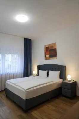 Ein Bett oder Betten in einem Zimmer der Unterkunft Bovino Hotel