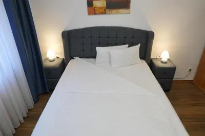 Ein Bett oder Betten in einem Zimmer der Unterkunft Bovino Hotel
