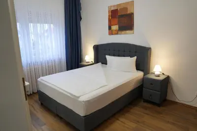 Ein Bett oder Betten in einem Zimmer der Unterkunft Bovino Hotel
