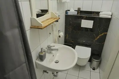 Ein Badezimmer in der Unterkunft Bovino Hotel