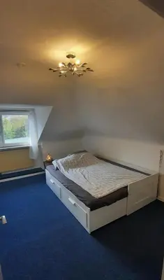 Ein Bett oder Betten in einem Zimmer der Unterkunft Alte Villa mit Terrasse