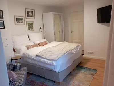 Ein Bett oder Betten in einem Zimmer der Unterkunft Schenkgasse 4