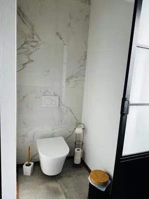 Ein Badezimmer in der Unterkunft ANINA